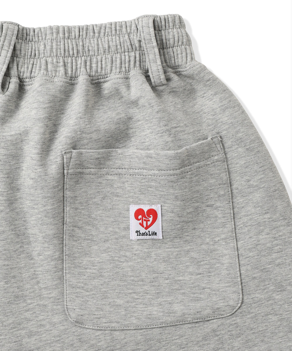 TL heart logo patch balloon sweat pants