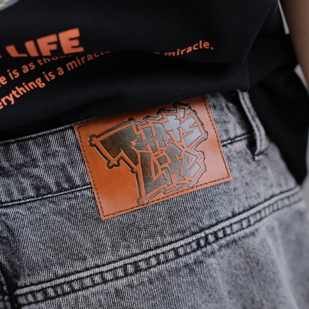 That’s life Angel logo Denim pants